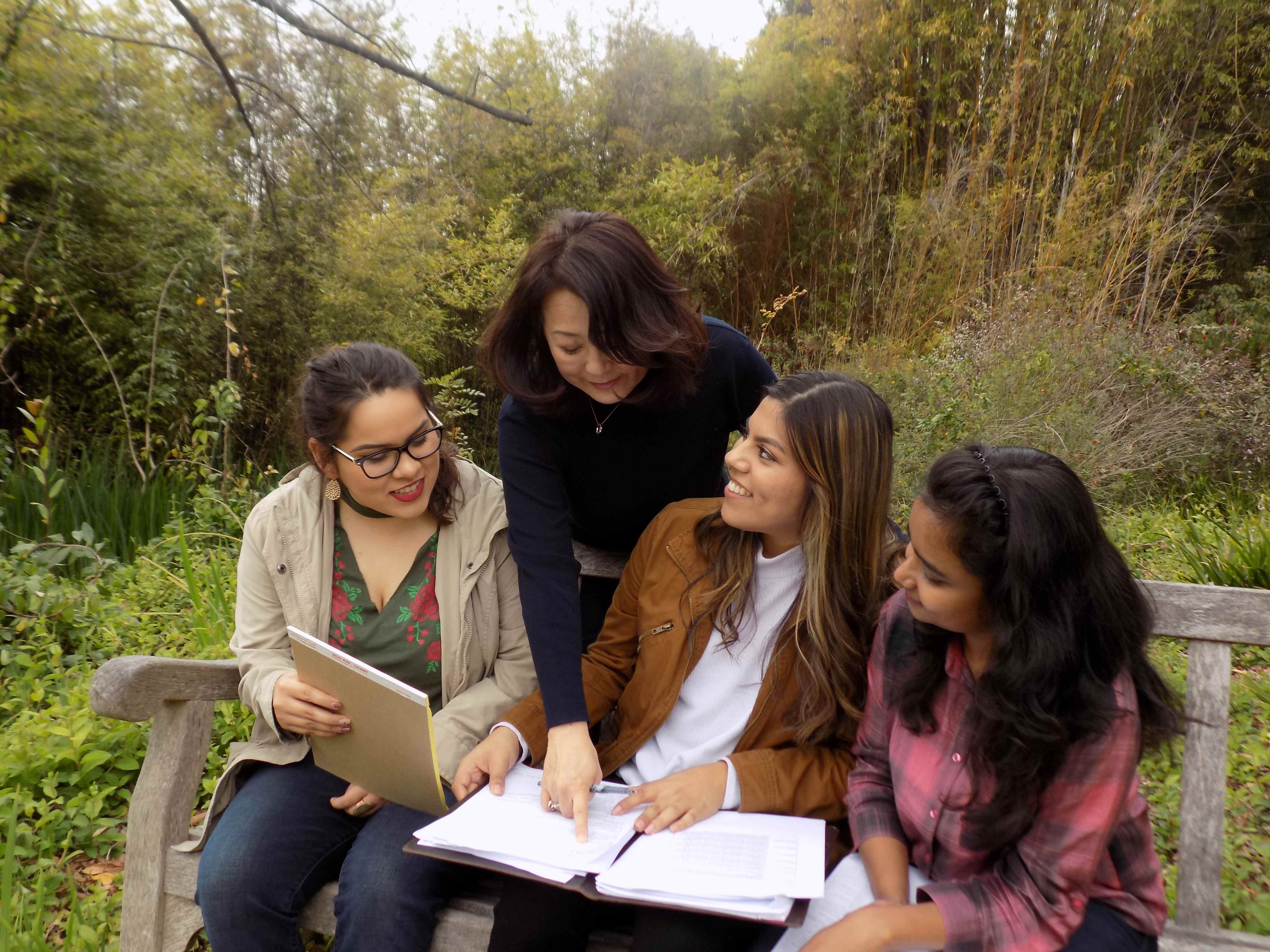 Candidates study by the lake