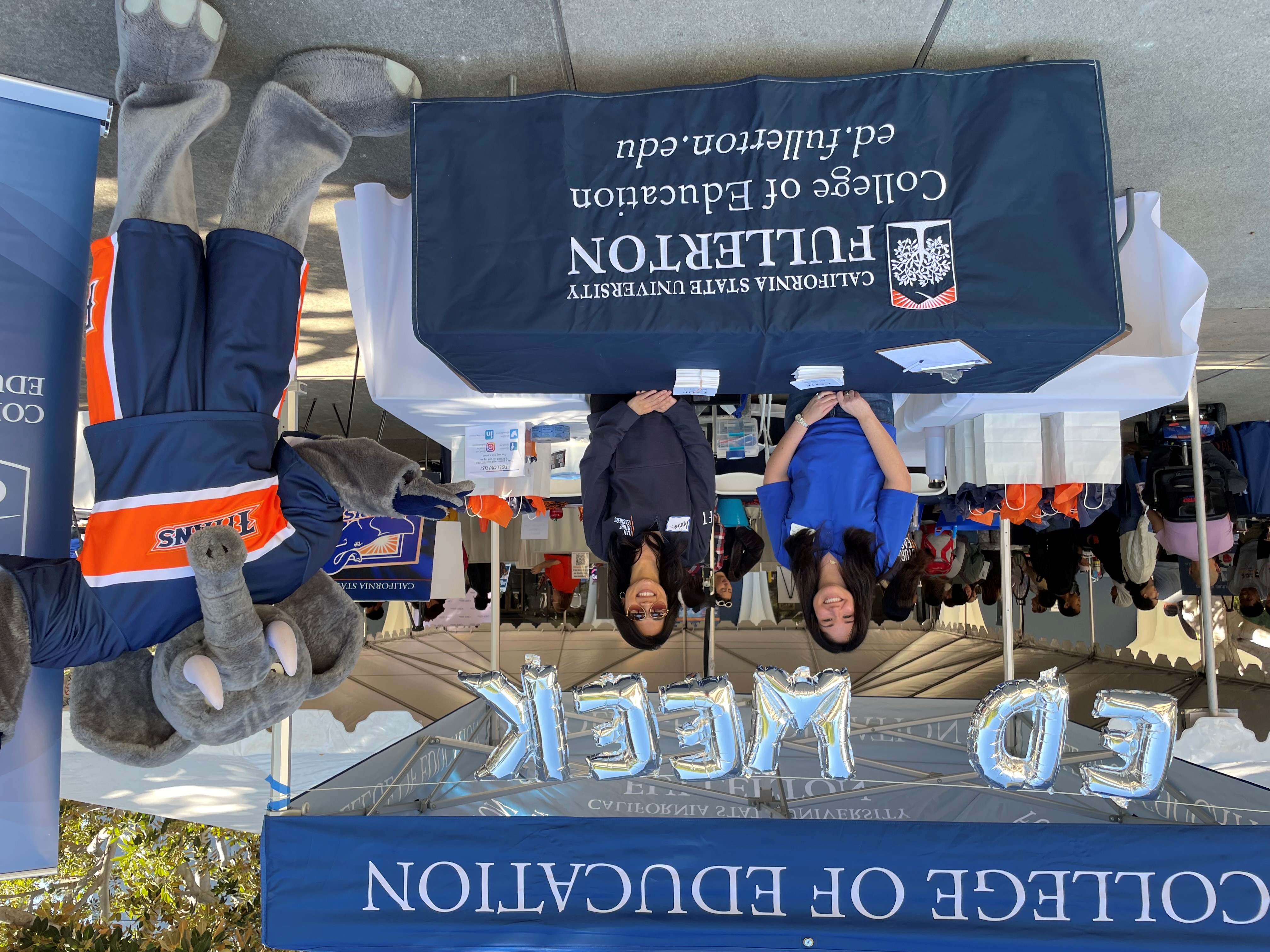 Tuffy and COE Staff Welcome table