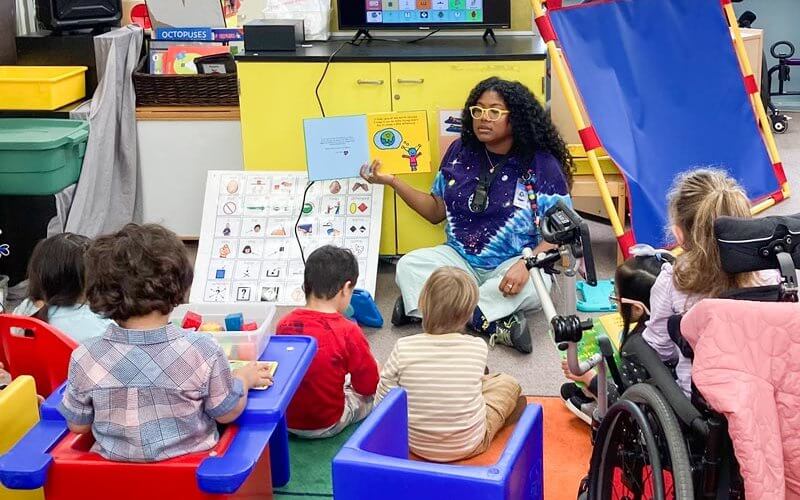 Ainara Johnson teaches a group of students