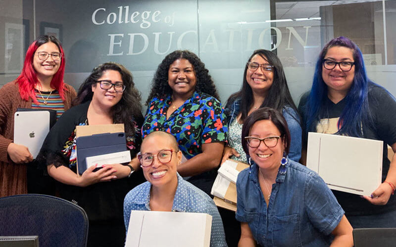 Inclusive Faculty smile for a picture 